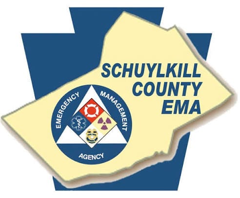 Map of Schuylkill County with Emergency Management Agency logo on a blue star background