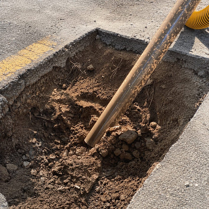 AirSpade Vac Vacuum Excavator in Use - Road Trench Wand Closeup
