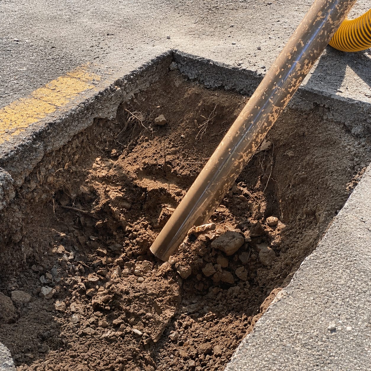 AirSpade Vac Vacuum Excavator in Use - Road Trench Wand Closeup